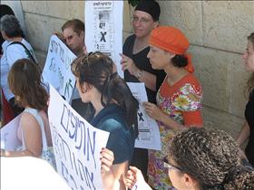 Religious and secular activists from women's organizations demonstrate against the segregation lines. 2009