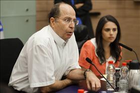 Defense Minister Moshe Ya'alon and Chair of the Committee to draft the Equality in Sharing the Burden Law MK Ayelet Shaked of Habayit Hayehudi in committee meeting. 9.15.2013. Photo: Flash90