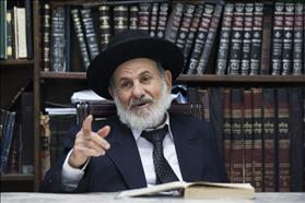 Rabbi Tzion Boaron of the Supreme Rabbinical Court in his home. Photo: Yonatan Sindel/Flash90