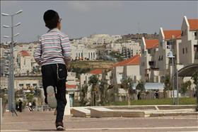 Haredi child running in Beitar Illit. 09.04.2010. Photo: Nati Shohat