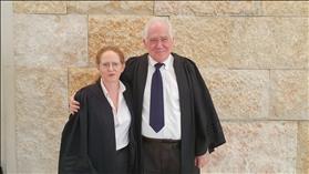 Rabbi Uri Regev and Yifat Solel, attorneys from Hiddush
