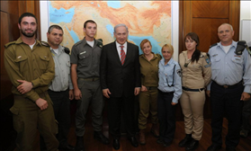 Prime Minister, Benjamin Netanyahu meets with soldiers  in his office before the IDF conversion. 15.12.2010. Photography: Amos Ben Gershom, Government Press Office via Flash 90