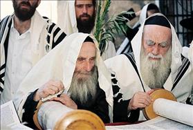 Haredi Jews at prayer during Festival of Sukkot, source: Wikipedia