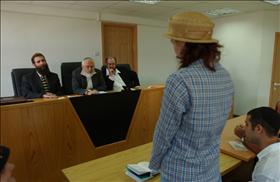 A women converting to Judaism in front of a three-judge Orthodox rabbinic court in Jerusalem. (Flash90)
